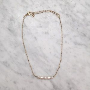 Gold Necklace with Different Sized Pearls